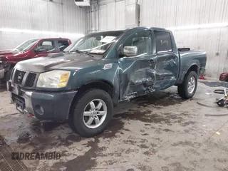 2004 Nissan Titan LE with VIN 1N6AA07B14N511618, listed as a IAAI auction lot 41336419 with 195,863 mi miles and . Bid and sale history available at carsss.com. Image 17.