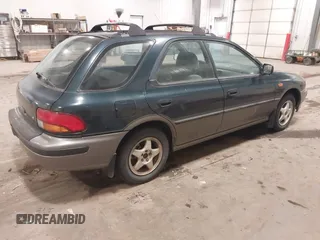 1996 Subaru Impreza Outback Special Sports with VIN JF1GF4858TH810489, listed as a IAAI auction lot 41361018 with 204,924 mi miles and . Bid and sale history available at DreamBid. Image 4.