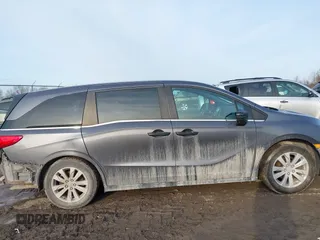 2018 Honda Odyssey LX with VIN 5FNRL6H27JB095795, listed as a IAAI auction lot 41780386 with 99,318 mi miles. Bid and sale history available at carsss.com. Image 13.