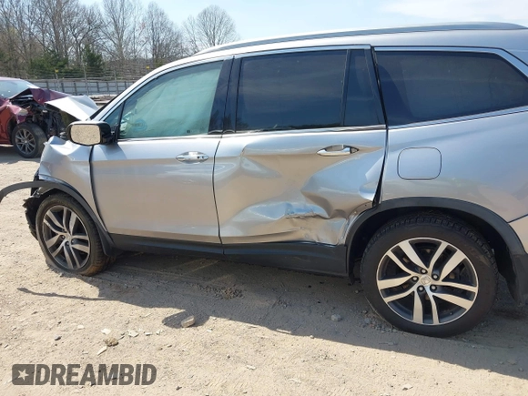 2017 Honda Pilot Touring with VIN 5FNYF6H98HB100335, listed as a IAAI auction lot 41907709 with 1 mi miles. Bid and sale history available at carsss.com. Image 14.