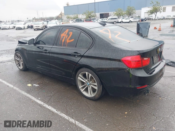 2015 BMW 3 Series 328i with VIN WBA3A5G51FNS83378, listed as a IAAI auction lot 41719392 with 114,146 mi miles. Bid and sale history available at carsss.com. Image 3.