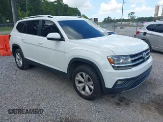 2018 Volkswagen Atlas SE z VIN 1V2CR2CA1JC533699, wystawiony jako IAAI lot #42412056 z przebiegiem 149 433 mil mil oraz . Historia ofert i sprzedaży dostępna na DreamBid. Obrazek 1.