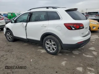 2015 Mazda CX-9 Touring z VIN JM3TB3CV3F0450354, wystawiony jako Copart lot #42934625 z przebiegiem Nie podano mil oraz Szkoda całkowita • Salvage title. Historia ofert i sprzedaży dostępna na DreamBid. Obrazek 2.
