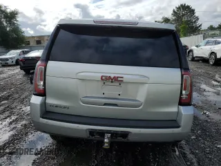 2015 GMC Yukon SLT with VIN 1GKS2BKC9FR518381, listed as a Copart auction lot 66352864 with 103,419 mi miles and Salvage Title. Bid and sale history available at carsss.com. Image 6.