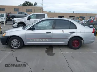 2001 Honda Civic LX with VIN 1HGES15511L023007, listed as a IAAI auction lot 41577660 with 288,408 mi miles. Bid and sale history available at carsss.com. Image 14.