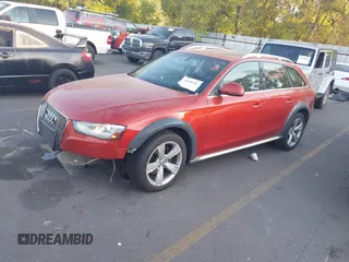 2014 Audi allroad Premium Plus with VIN WA1UFAFL1EA069928, listed as a IAAI auction lot 40558283 with 138,316 mi miles. Bid and sale history available at carsss.com. Image 2.