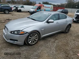 2013 Jaguar XF RWD with VIN SAJWA0E77D8S67237, listed as a Copart auction lot 42128545 with 97,665 mi miles and Salvage Title. Bid and sale history available at DreamBid. Image 1.