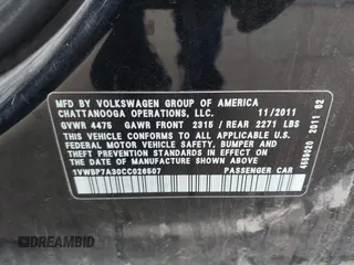 2012 Volkswagen Passat SE with VIN 1VWBP7A30CC026507, listed as a IAAI auction lot 42042850 with 202,406 mi miles. Bid and sale history available at carsss.com. Image 9.