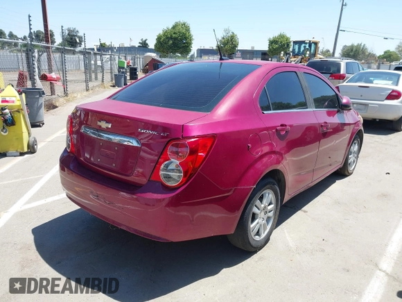 2014 Chevrolet Sonic LT with VIN 1G1JC5SH7E4121869, listed as a IAAI auction lot 42204925 with 122,394 mi miles and . Bid and sale history available at DreamBid. Image 4.