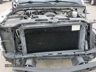 2015 Chevrolet Tahoe LT z VIN 1GNSCBKC0FR210211, wystawiony jako Copart lot #55496995 z przebiegiem 128 296 mil mil oraz Szkoda całkowita • Salvage title. Historia ofert i sprzedaży dostępna na DreamBid. Obrazek 11.
