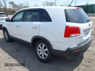 2011 Kia Sorento LX with VIN 5XYKTCA11BG180272, listed as a IAAI auction lot 42125073 with 137,156 mi miles and . Bid and sale history available at DreamBid. Image 3.