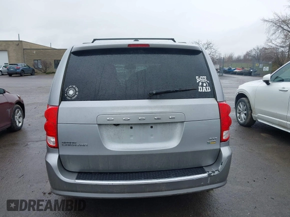 2019 Dodge Grand Caravan SXT with VIN 2C4RDGCG1KR580039, listed as a IAAI auction lot 41997472 with 163,915 mi miles and . Bid and sale history available at DreamBid. Image 17.