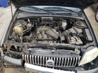 2005 Mercury Mariner Luxury z VIN 4M2YU57185DJ27043, wystawiony jako Copart lot #52980555 z przebiegiem 152 406 mil mil oraz Szkoda całkowita • Salvage title. Historia ofert i sprzedaży dostępna na DreamBid. Obrazek 11.