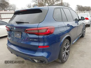 2023 BMW X5 xDrive45e with VIN 5UXTA6C09P9R03213, listed as a IAAI auction lot 41538207 with 25,114 mi miles. Bid and sale history available at carsss.com. Image 4.