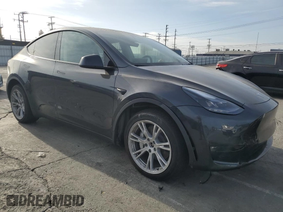 2024 Tesla Model Y Long Range with VIN 7SAYGDEE8RF089456, listed as a Copart auction lot 85521934 with 13,837 mi miles and Salvage title. Bid and sale history available at DreamBid. Image 4.