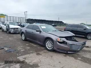 2013 Chrysler 300 with VIN 2C3CCAAG9DH735717, listed as a IAAI auction lot 42535858 with 175,037 mi miles and . Bid and sale history available at DreamBid. Image 1.