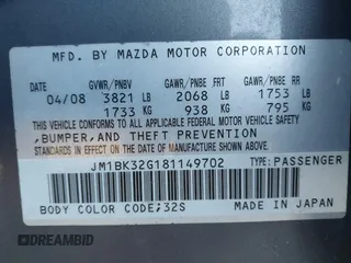 2008 Mazda 3 i Touring Value with VIN JM1BK32G181149702, listed as a IAAI auction lot 41800136 with 205,677 mi miles. Bid and sale history available at carsss.com. Image 9.