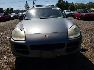 2004 Porsche Cayenne S with VIN WP1AB29P04LA75827, listed as a Copart auction lot 68295874 with 154,492 mi miles and Salvage Title. Bid and sale history available at carsss.com. Image 12.