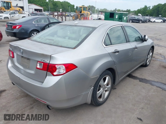 2010 Acura TSX with VIN JH4CU2F60AC019462, listed as a IAAI auction lot 42109261 with 112,131 mi miles. Bid and sale history available at carsss.com. Image 4.