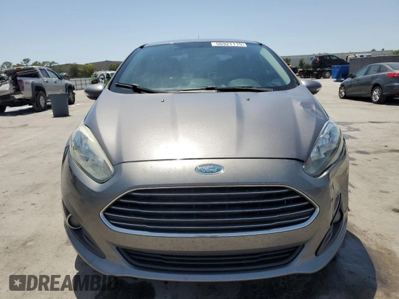 2014 Ford Fiesta SE z VIN 3FADP4BJ4EM110277, wystawiony jako Copart lot #56921115 z przebiegiem 126 536 mil mil oraz Szkoda całkowita • Salvage title. Historia ofert i sprzedaży dostępna na DreamBid. Obrazek 5.