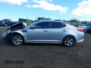 2015 Kia Optima LX z VIN 5XXGM4A74FG476636, wystawiony jako IAAI lot #41242478 z przebiegiem Nie podano mil oraz . Historia ofert i sprzedaży dostępna na DreamBid. Obrazek 14.