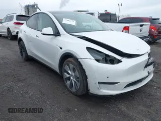 2022 Tesla Model Y Long Range z VIN 7SAYGDEE7NF389788, wystawiony jako IAAI lot #42014111 z przebiegiem 37 606 mil mil oraz . Historia ofert i sprzedaży dostępna na DreamBid. Obrazek 1.