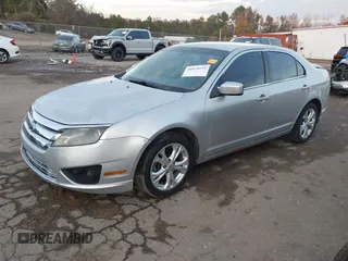 2012 Ford Fusion SE z VIN 3FAHP0HA4CR213409, wystawiony jako IAAI lot #41079155 z przebiegiem 139 129 mil mil oraz . Historia ofert i sprzedaży dostępna na DreamBid. Obrazek 17.