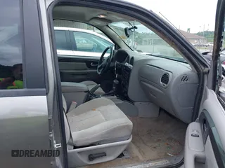2007 GMC Envoy SLE with VIN 1GKDS13S272278285, listed as a IAAI auction lot 40006486 with 158,109 mi miles. Bid and sale history available at carsss.com. Image 5.