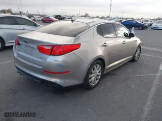 2014 Kia Optima EX with VIN 5XXGN4A76EG289586, listed as a IAAI auction lot 41536459 with 65,739 mi miles. Bid and sale history available at carsss.com. Image 4.