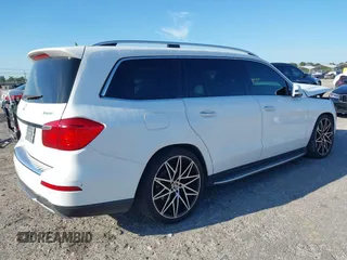 2014 Mercedes-Benz GL-Class GL 450 with VIN 4JGDF7CE1EA387056, listed as a IAAI auction lot 41899945 with 126,842 mi miles. Bid and sale history available at carsss.com. Image 4.