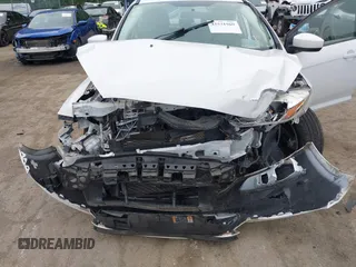 2018 Ford Focus SE z VIN 1FADP3F24JL247003, wystawiony jako IAAI lot #42531969 z przebiegiem 55 344 mil mil oraz . Historia ofert i sprzedaży dostępna na DreamBid. Obrazek 6.