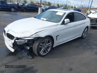 2019 BMW 4 Series 440i with VIN WBA4J5C52KBM65208, listed as a IAAI auction lot 41734154 with 52,477 mi miles and . Bid and sale history available at DreamBid. Image 2.