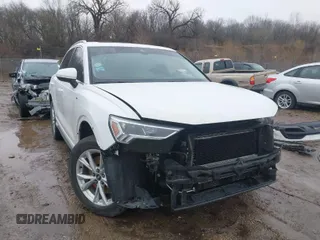 2021 Audi Q3 S line Premium Plus with VIN WA1EECF3XM1020244, listed as a IAAI auction lot 41673299 with 57,731 mi miles. Bid and sale history available at carsss.com. Image 1.