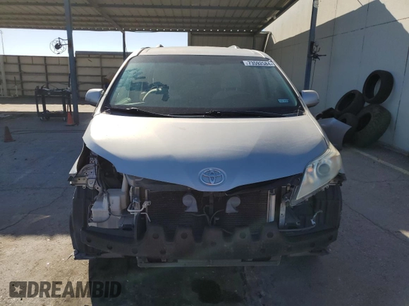 2012 Toyota Sienna LE AAS with VIN 5TDKK3DC8CS259085, listed as a Copart auction lot 73592584 with 198,370 mi miles and Salvage Title. Bid and sale history available at DreamBid. Image 5.