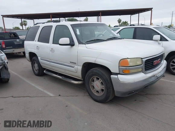 2002 GMC Yukon SLT with VIN 1GKEC13T02R313772, listed as a IAAI auction lot 42131289 with 215,164 mi miles. Bid and sale history available at carsss.com. Image 1.