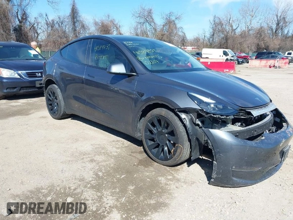 2023 Tesla Model Y Long Range with VIN 7SAYGDEE2PF883687, listed as a IAAI auction lot 41589837 with 36,890 mi miles. Bid and sale history available at carsss.com. Image 1.
