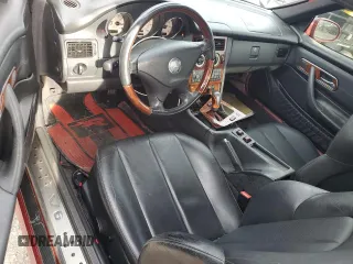 2001 Mercedes-Benz SLK 230/320 z VIN WDBKK65F71F177838, wystawiony jako Copart lot #58118125 z przebiegiem 156 970 mil mil oraz Szkody całkowita. Historia ofert i sprzedaży dostępna na DreamBid. Obrazek 8.