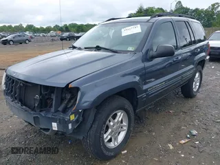 2000 Jeep Grand Cherokee Limited with VIN 1J4GW58N1YC395806, listed as a IAAI auction lot 42267747 with 180,120 mi miles and . Bid and sale history available at DreamBid. Image 2.