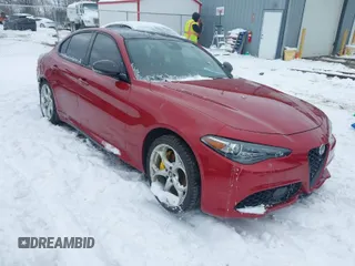2021 Alfa Romeo Giulia Ti z VIN ZARFANBN5M7641290, wystawiony jako IAAI lot #41593350 z przebiegiem 59 664 mil mil oraz . Historia ofert i sprzedaży dostępna na DreamBid. Obrazek 1.