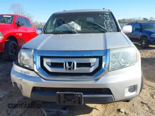 2009 Honda Pilot Touring with VIN 5FNYF48979B008851, listed as a IAAI auction lot 41252736 with 183,292 mi miles and . Bid and sale history available at carsss.com. Image 12.