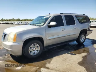 2007 GMC Yukon XL SLT with VIN 1GKFC16J47J244377, listed as a Copart auction lot 71274824 with 156,806 mi miles and Salvage Title. Bid and sale history available at carsss.com. Image 1.