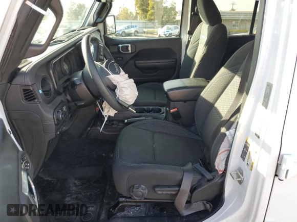 2024 Jeep Wrangler Rubicon with VIN 1C4RJXR6XRW115879, listed as a Copart auction lot 45816825 with 34,557 mi miles and Salvage Title. Bid and sale history available at DreamBid. Image 7.