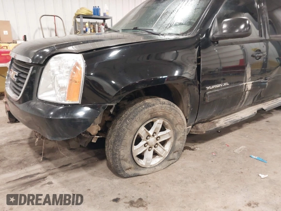 2013 GMC Yukon XL SLT z VIN 1GKS2KE78DR299361, wystawiony jako IAAI lot #41716354 z przebiegiem 283 195 mil mil oraz . Historia ofert i sprzedaży dostępna na DreamBid. Obrazek 6.