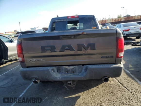 2016 Ram 1500 Rebel z VIN 1C6RR7YT6GS211830, wystawiony jako Copart lot #54072485 z przebiegiem 56 512 mil mil oraz Szkody całkowita. Historia ofert i sprzedaży dostępna na DreamBid. Obrazek 6.
