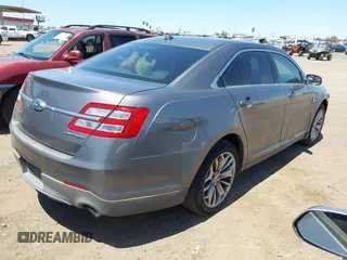2013 Ford Taurus Limited z VIN 1FAHP2F81DG103664, wystawiony jako IAAI lot #42224957 z przebiegiem 167 911 mil mil oraz . Historia ofert i sprzedaży dostępna na DreamBid. Obrazek 4.