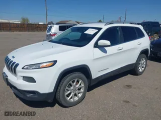 2014 Jeep Cherokee Latitude with VIN 1C4PJMCS4EW233979, listed as a IAAI auction lot 41976651 with 138,815 mi miles. Bid and sale history available at carsss.com. Image 17.