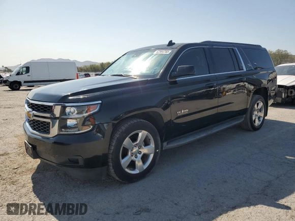 2015 Chevrolet Suburban LT with VIN 1GNSCJKC9FR732720, listed as a Copart auction lot 62564765 with 99,194 mi miles and Salvage title. Bid and sale history available at DreamBid. Image 1.