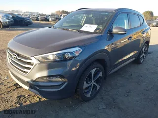 2018 Hyundai Tucson Value with VIN KM8J3CA2XJU776526, listed as a IAAI auction lot 41322657 with 102,444 mi miles. Bid and sale history available at carsss.com. Image 17.