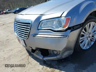 2014 Chrysler 300 C with VIN 2C3CCAKG6EH379114, listed as a IAAI auction lot 41992957 with 151,949 mi miles and . Bid and sale history available at carsss.com. Image 18.
