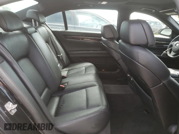 2012 BMW 7 Series 740Li with VIN WBAKB4C5XCC576227, listed as a Copart auction lot 52946135 with 154,611 mi miles and Salvage Title. Bid and sale history available at carsss.com. Image 10.
